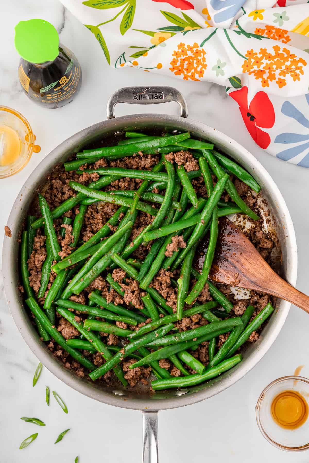 beef and green beans stir fry in a large skillet