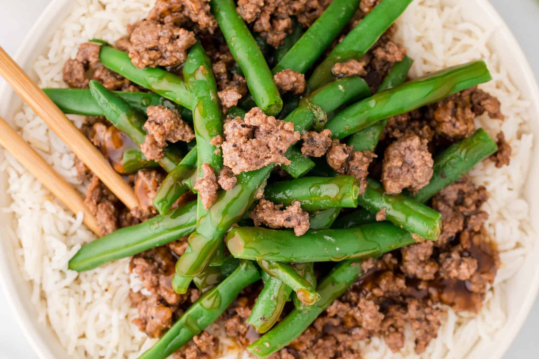 beef and green beans stir fry over white rice