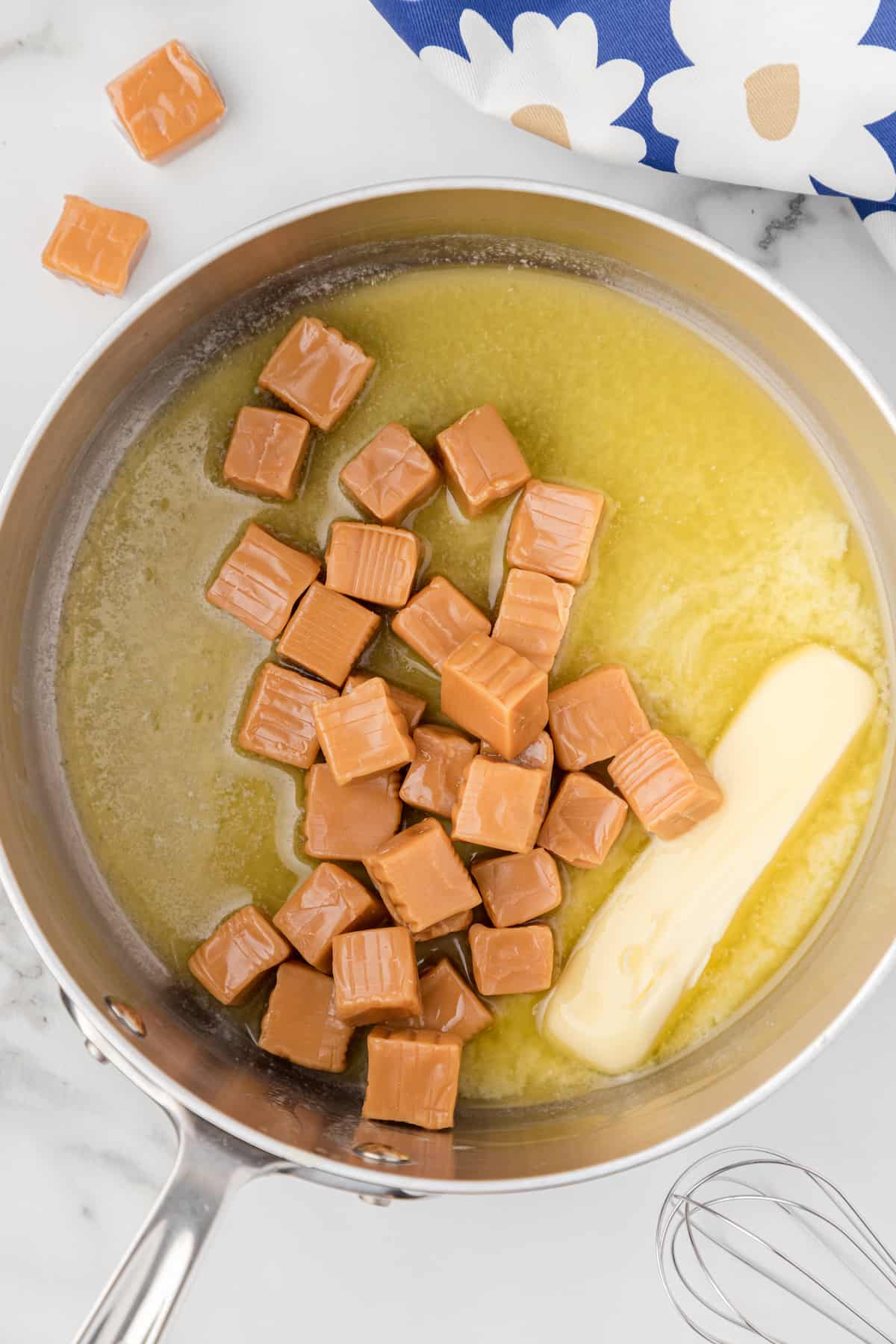 Melt the butter and caramels in a skillet