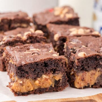 easy caramel turtle brownies on a piece of parchment paper