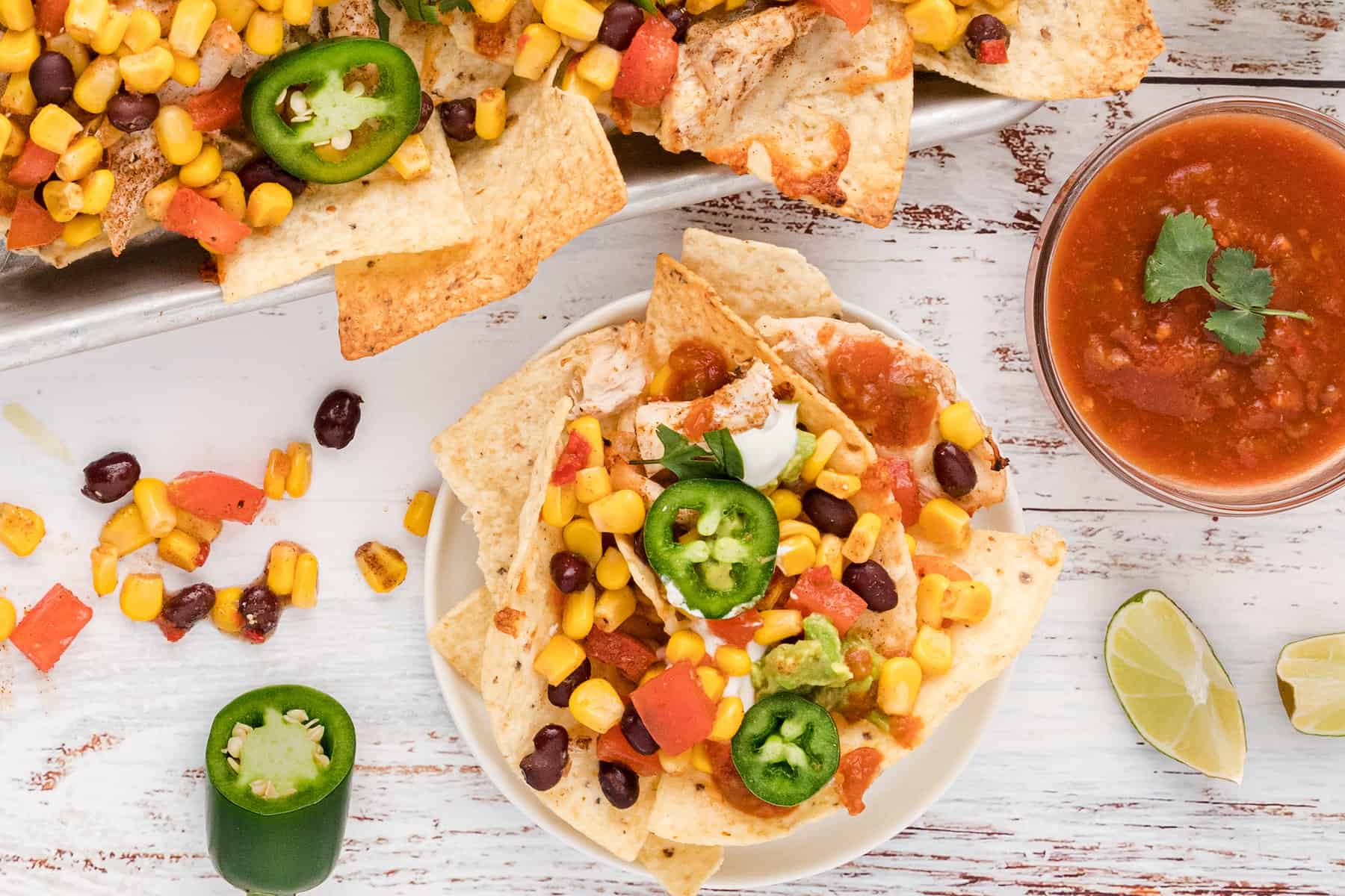 a single serving of jerk chicken sheet pan nachos