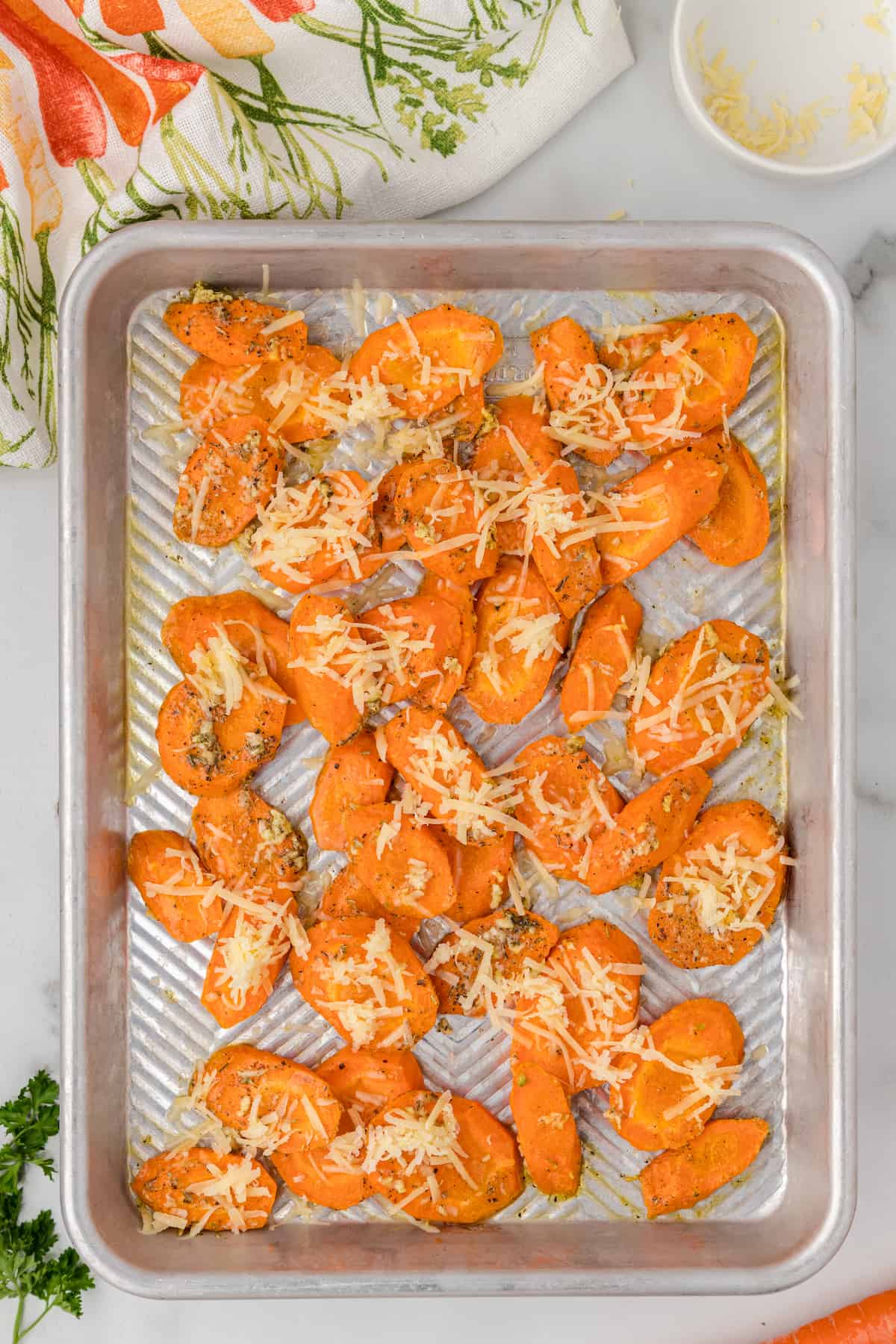 sprinkle the carrots with Parmesan cheese