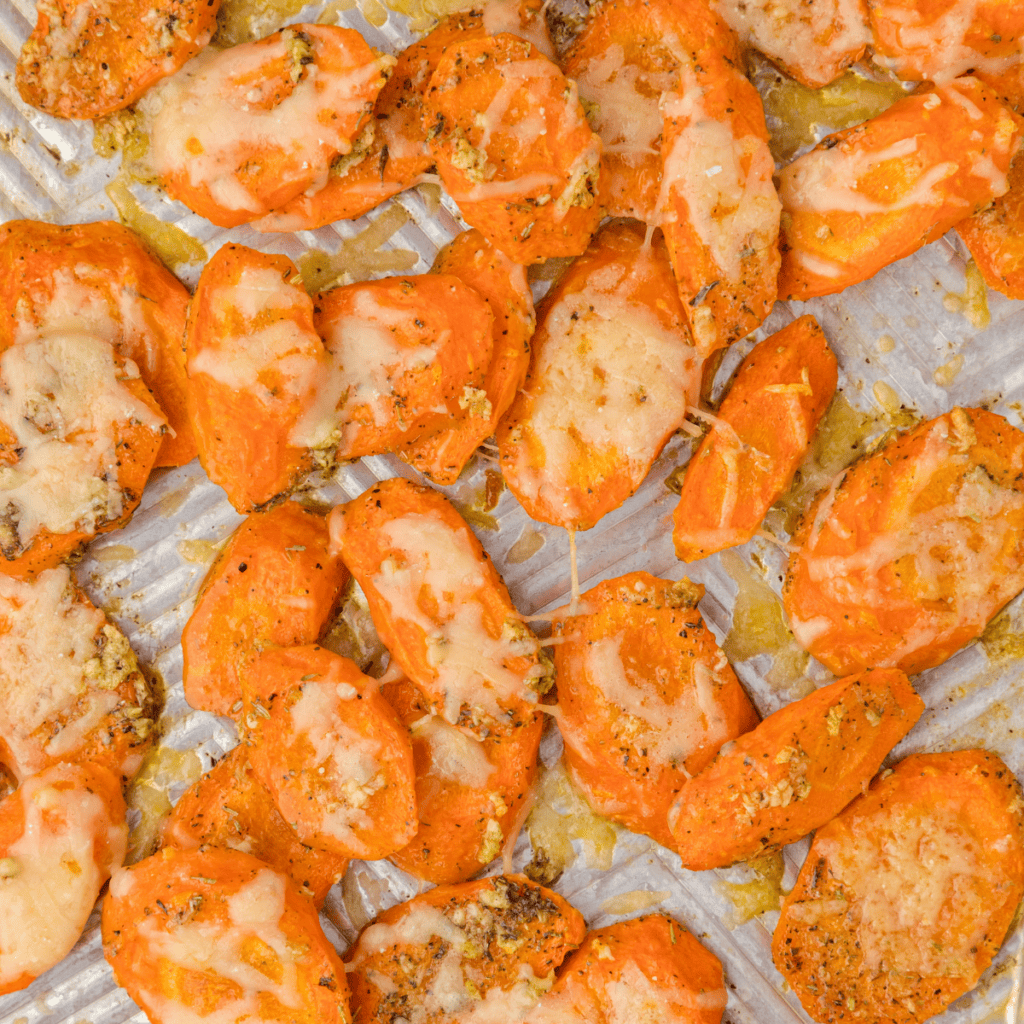 garlic parmesan roasted carrots on a sheet pan