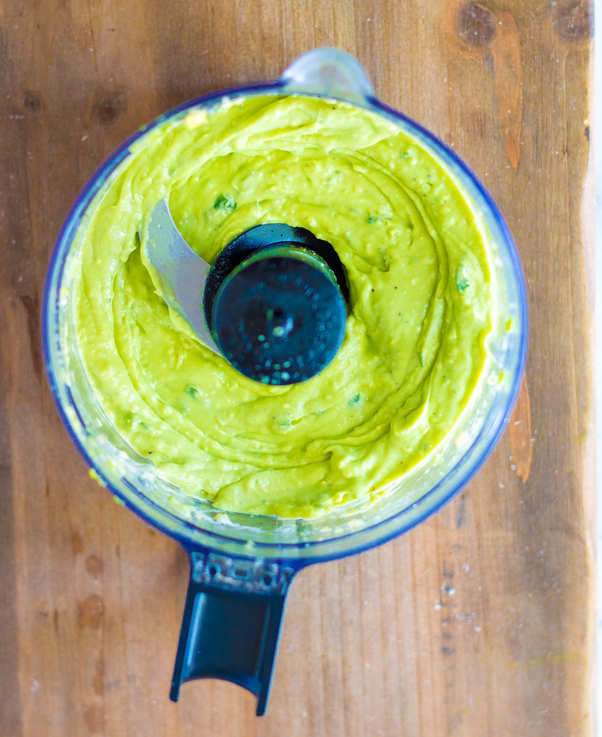 cilantro avocado lime salad dressing in a food processor