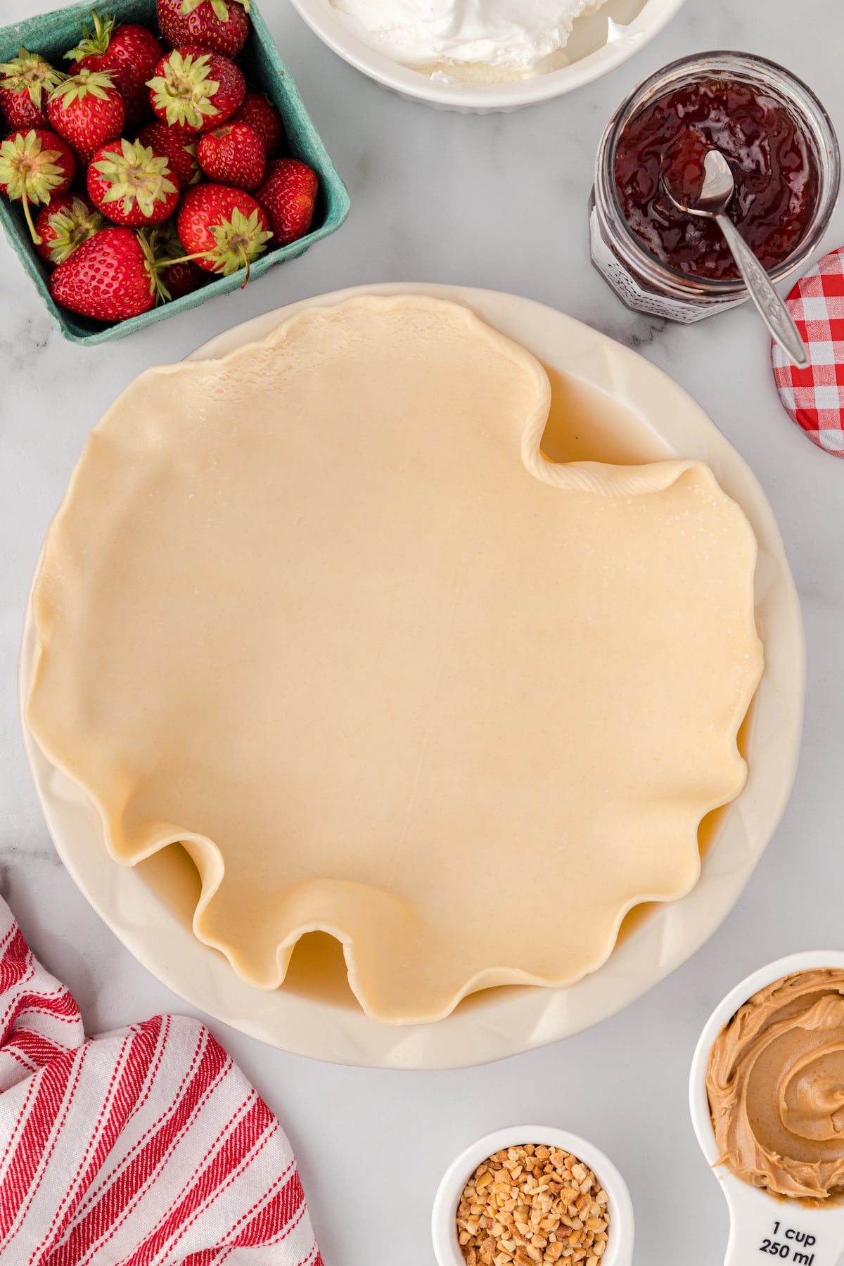 place an unbaked pie crust in a pie pan
