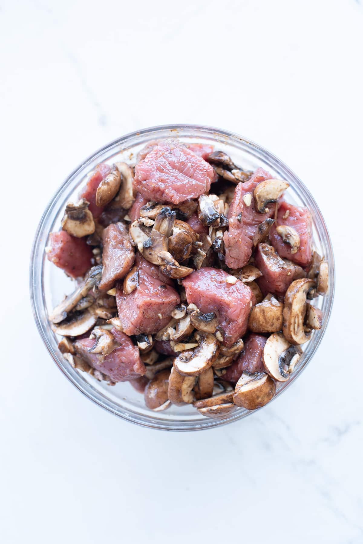 steak bites and mushrooms in a large bowl