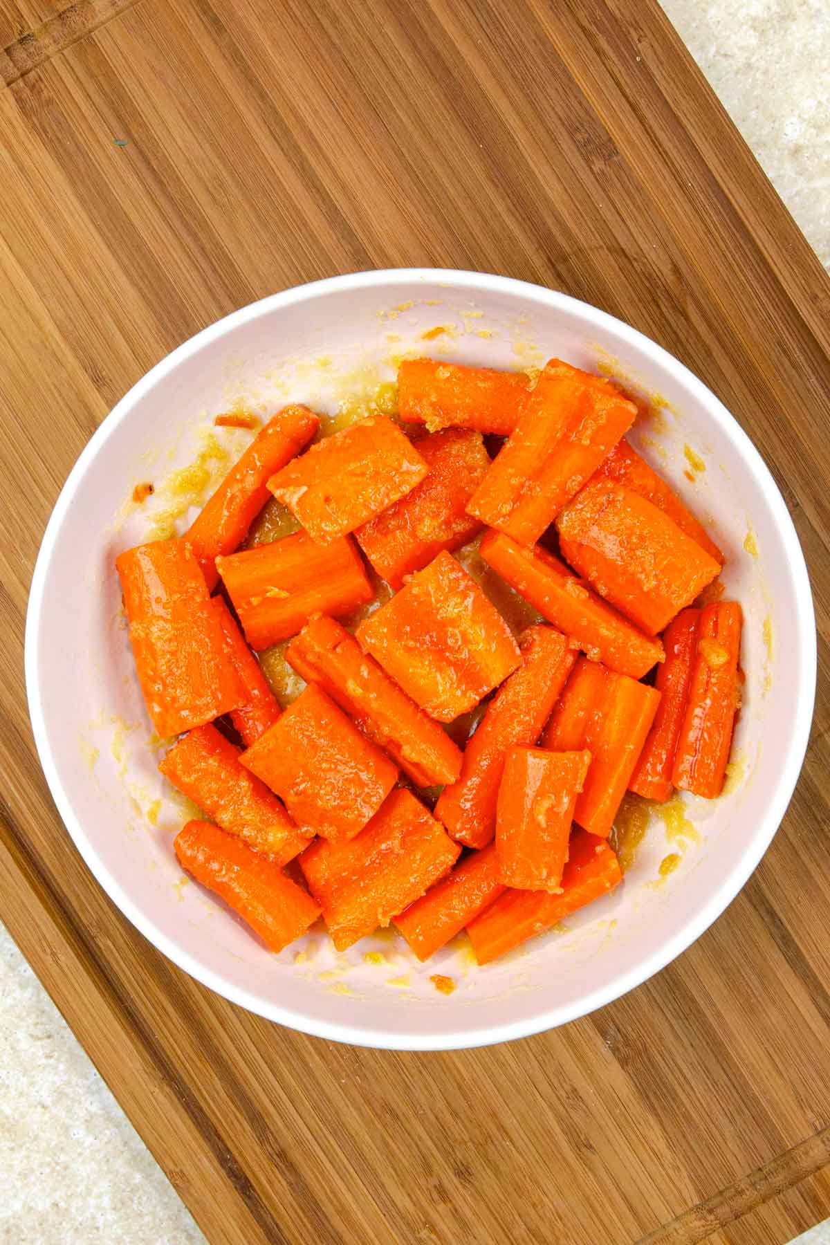 toss the raw carrots in the honey brown sugar glaze