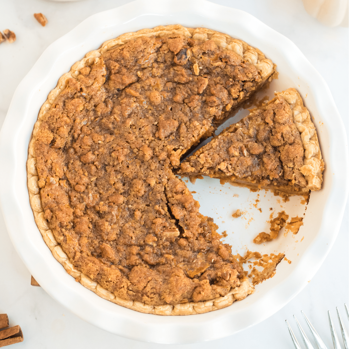 pumpkin pie with a pecan streusel topping