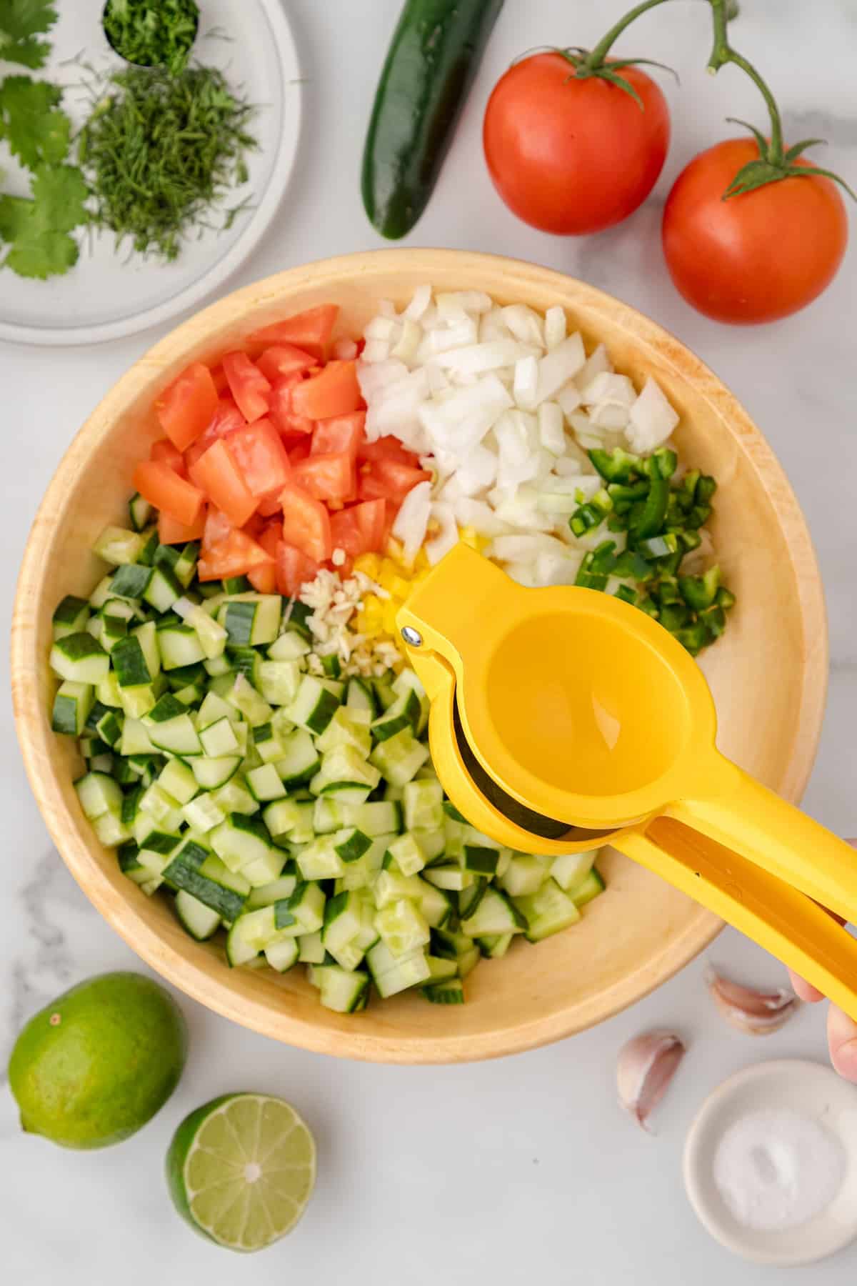 squeeze a lime over the cucumber salsa