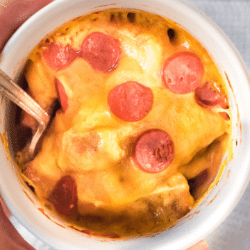 a 2-minute microwave pizza in a mug with cheese and mini pepperoni