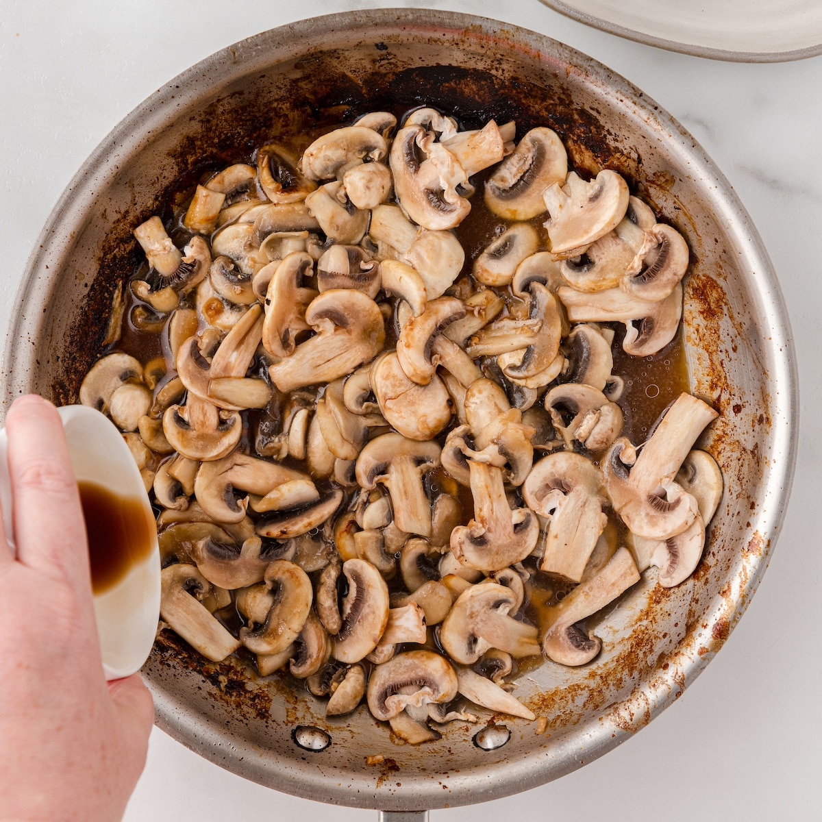 add remaining balsamic vinegar to the mushrooms