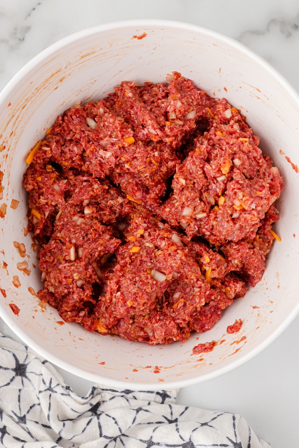 divide the ground beef mixture into 4 sections