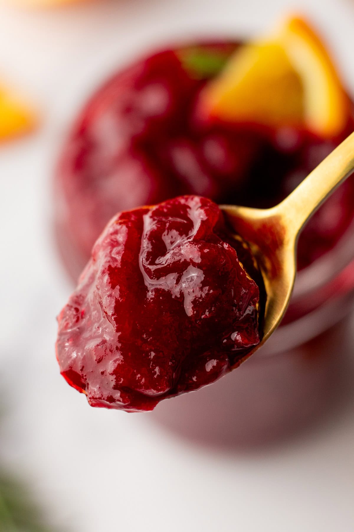 a spoonful of homemade cranberry sauce made with orange juice