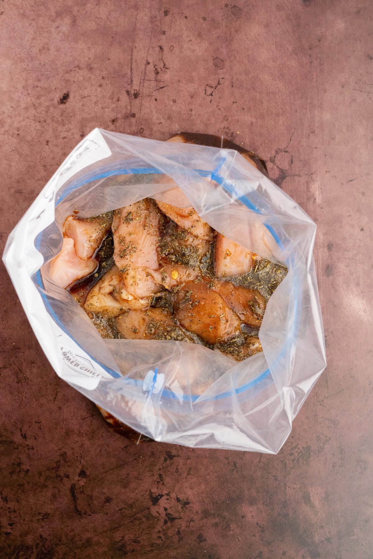 pour the balsamic marinade over the chicken in a zippered plastic bag