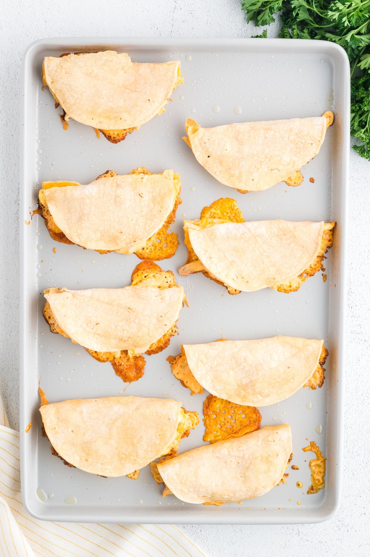 eight Buffalo chicken tacos after baking in the oven