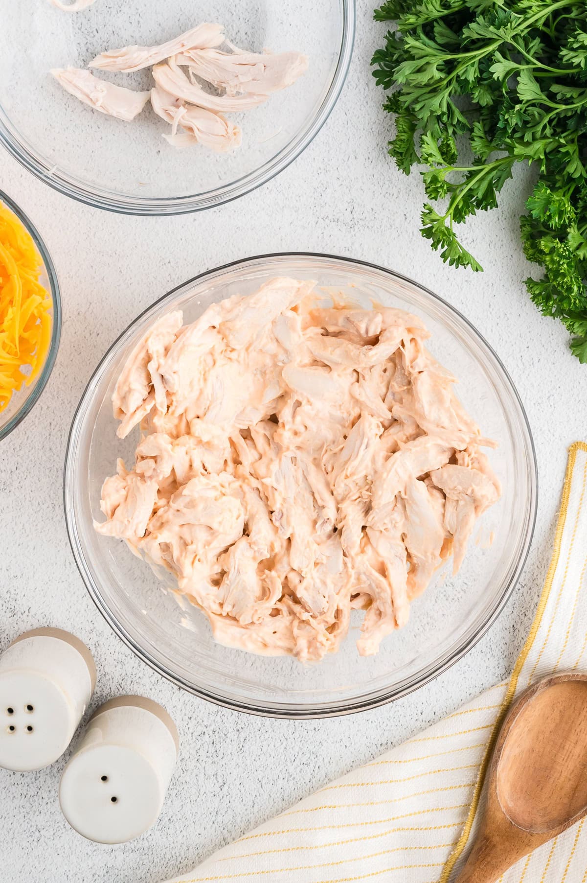mix the shredded rotisserie chicken with the buffalo cream cheese