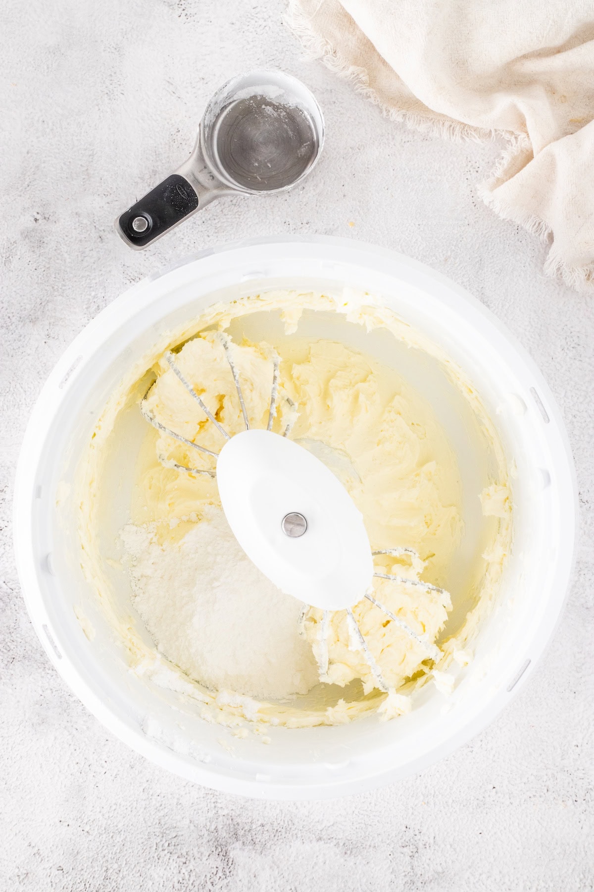 add the powdered sugar to the beaten cream cheese