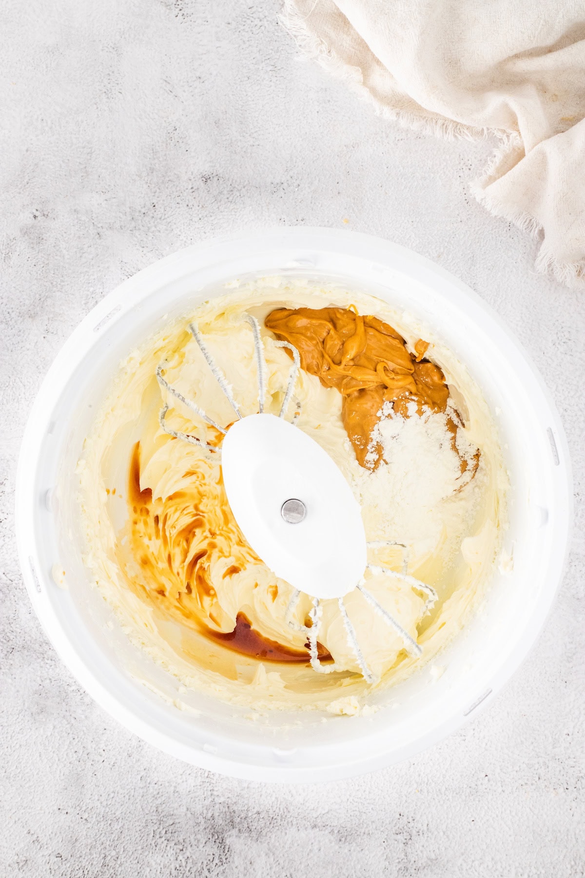 add the peanut butter, cornstarch, and vanilla bean paste to the sweetened cream cheese mixture