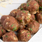 a close up of Garlic Parmesan Meatballs in the Oven