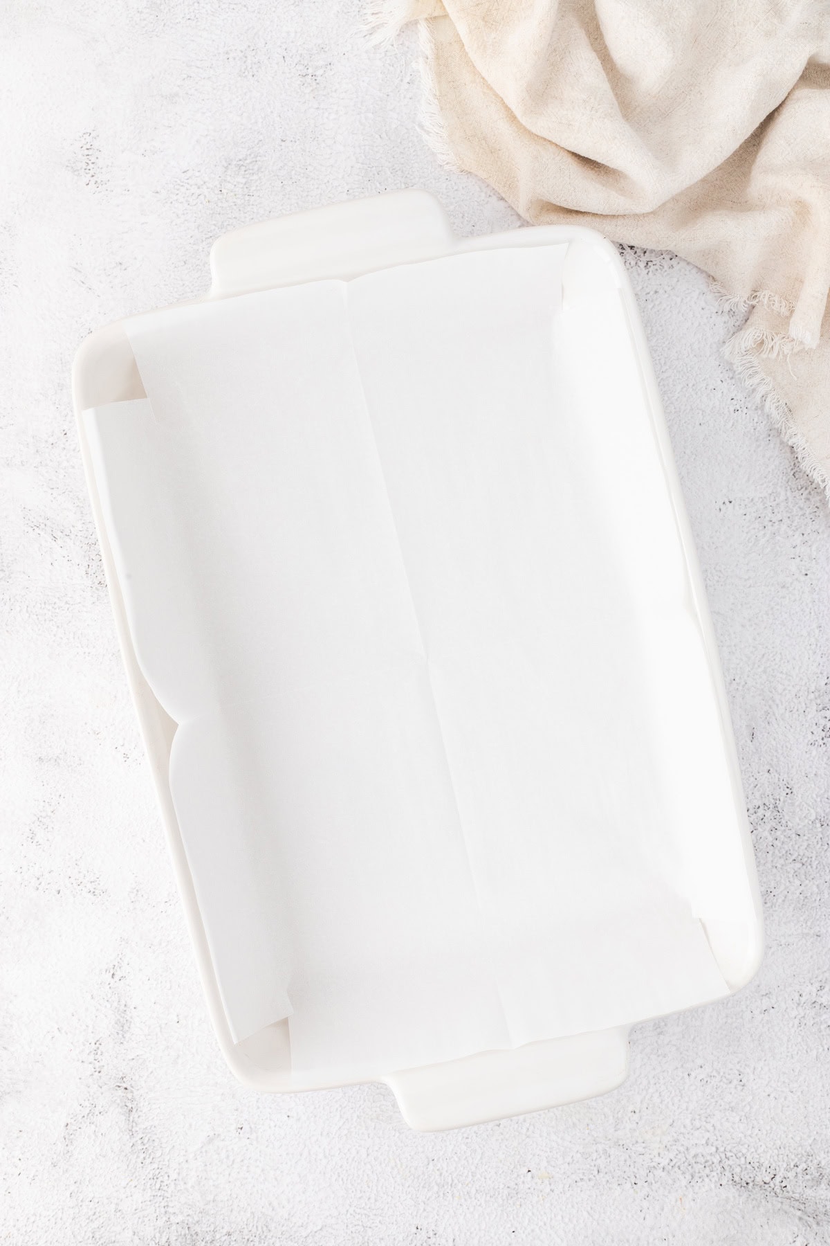 line a baking dish with parchment paper
