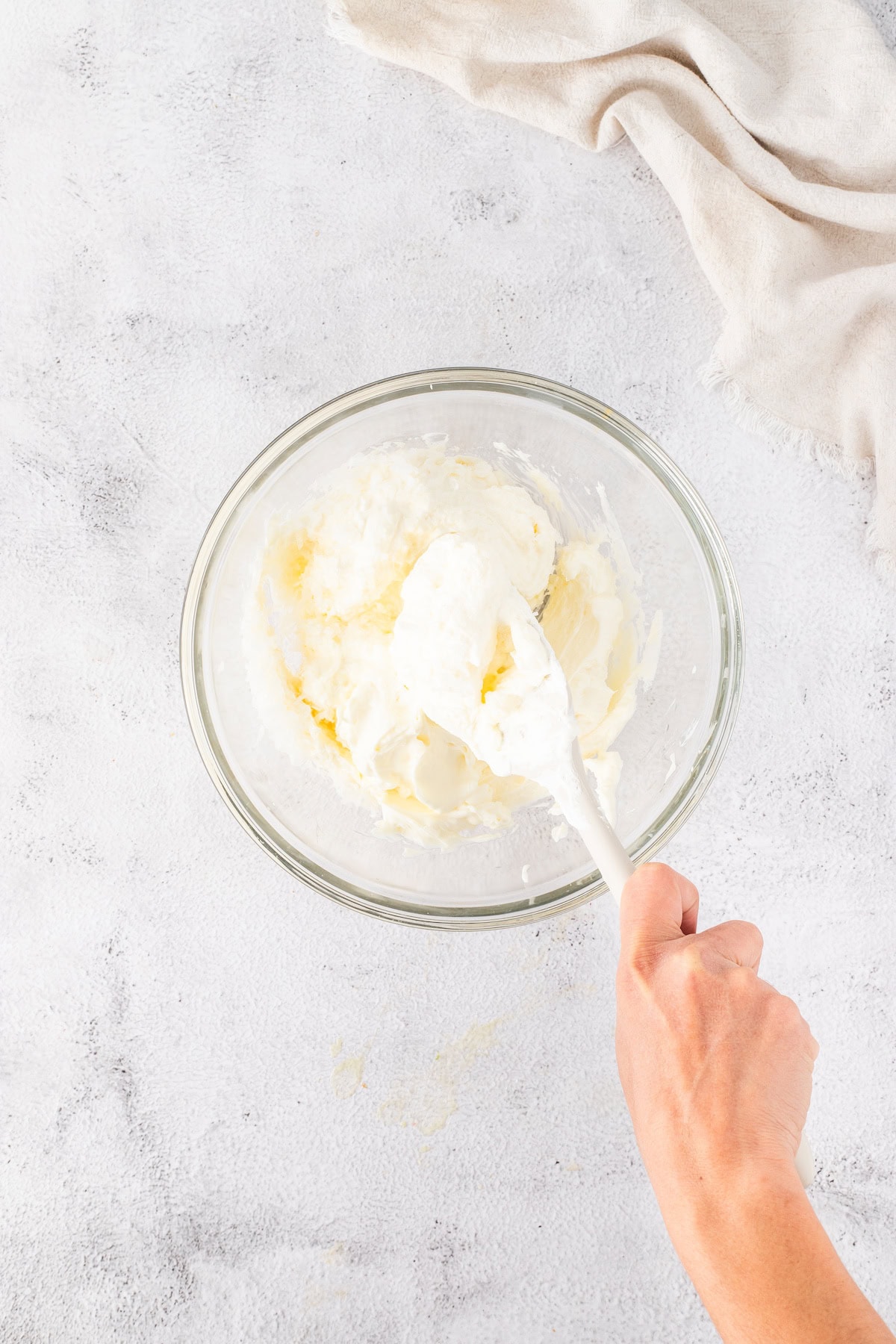fold the whipped cream and cream cheese together