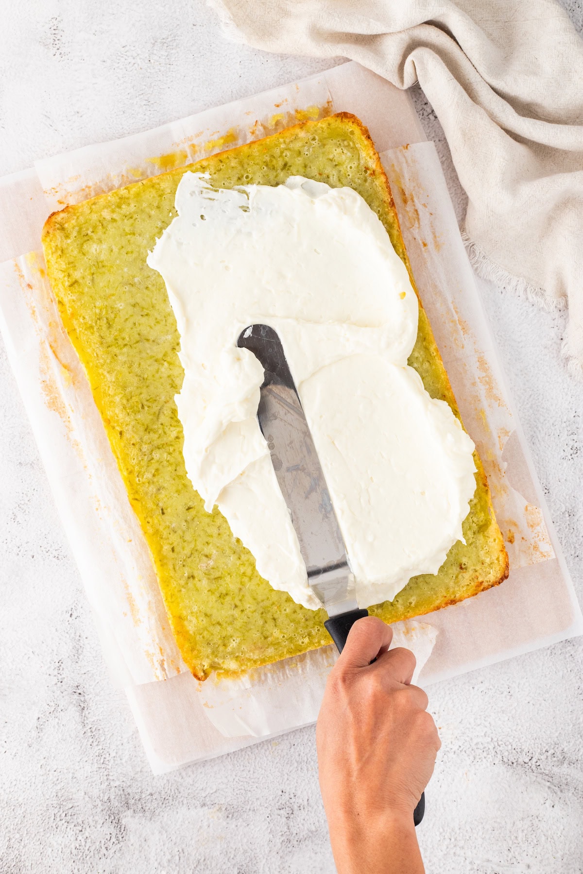 spread the cheesecake filling over the key lime pie filling