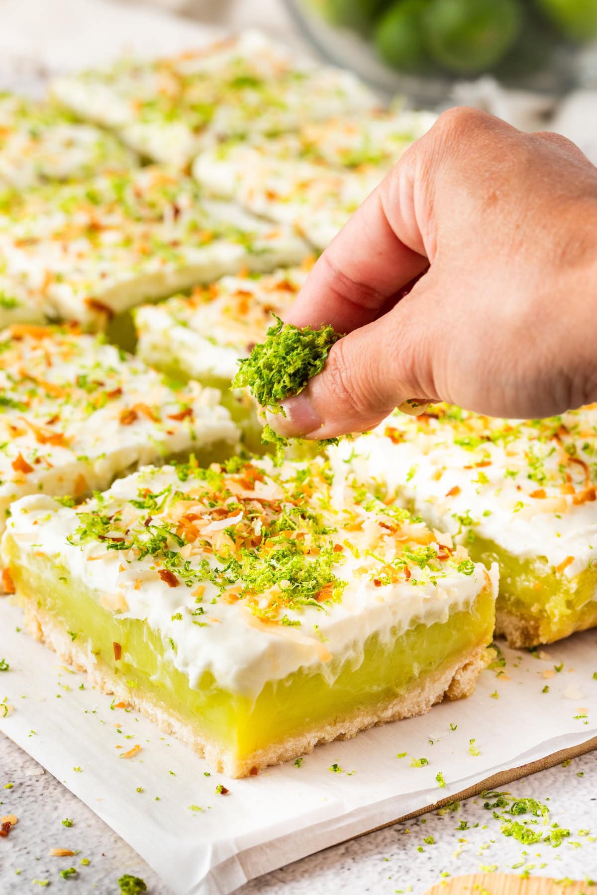 sprinkle the easy key lime pie bars with key lime zest