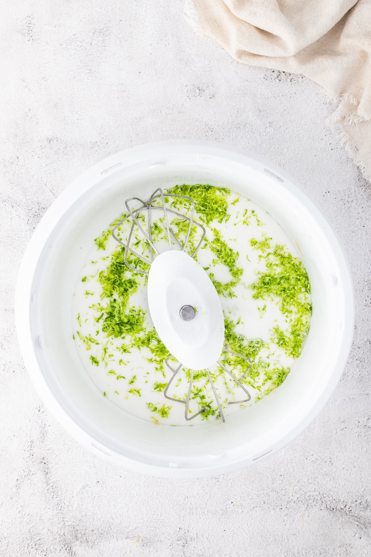 use a food processor to combine the key lime zest and sugar