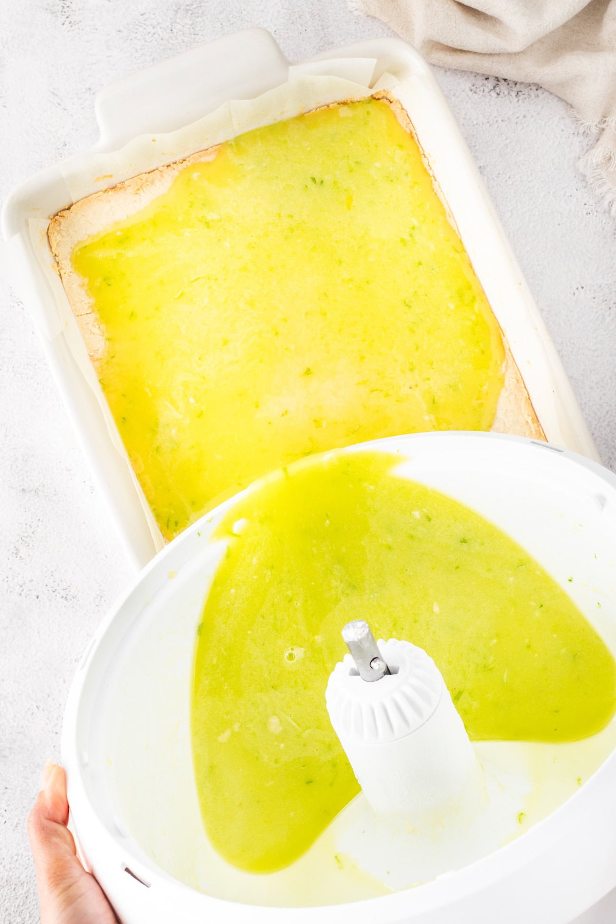 pour the key lime pie filling on top of the cookie crust