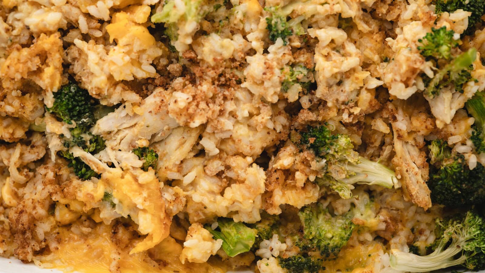 a close up of Chicken Broccoli Rice and Cheese Casserole