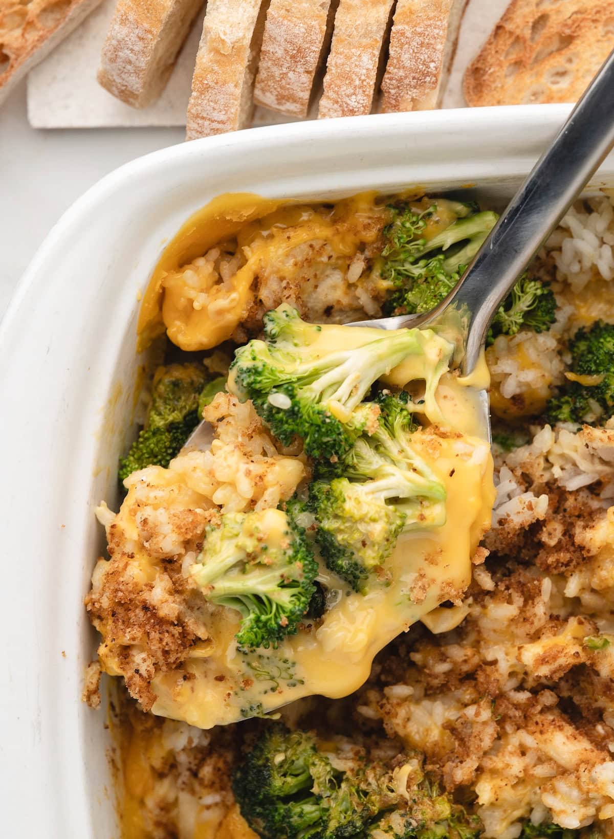 a cheesy scoop of Chicken Broccoli Rice and Cheese Casserole