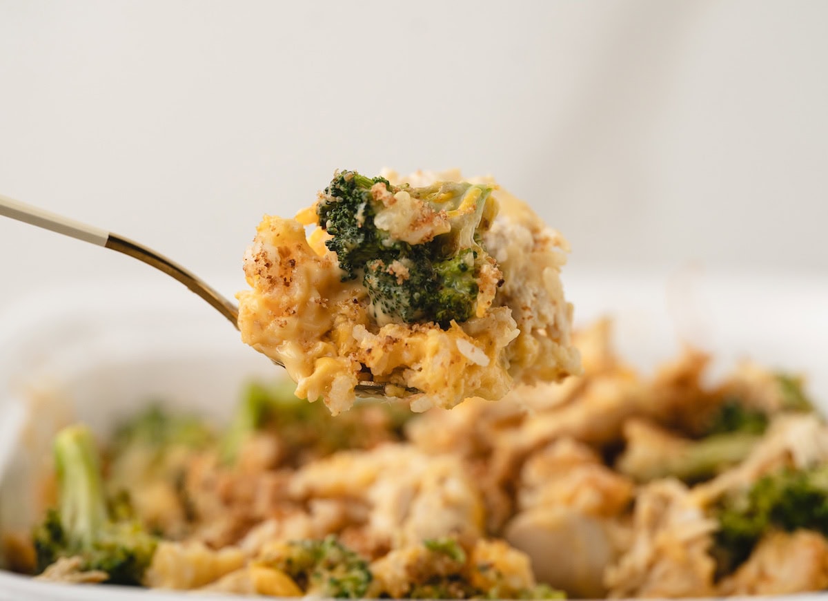 a spoonful of Chicken Broccoli Rice and Cheese Casserole