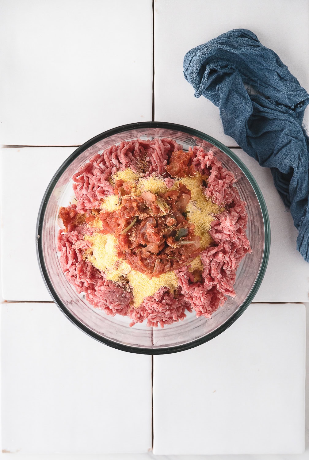 add the salsa and spices to the ground beef mixture