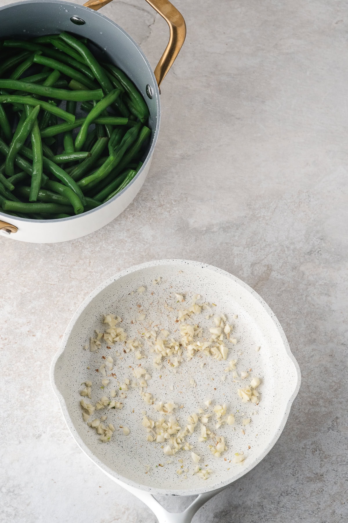 saute the fresh garlic in a large skillet