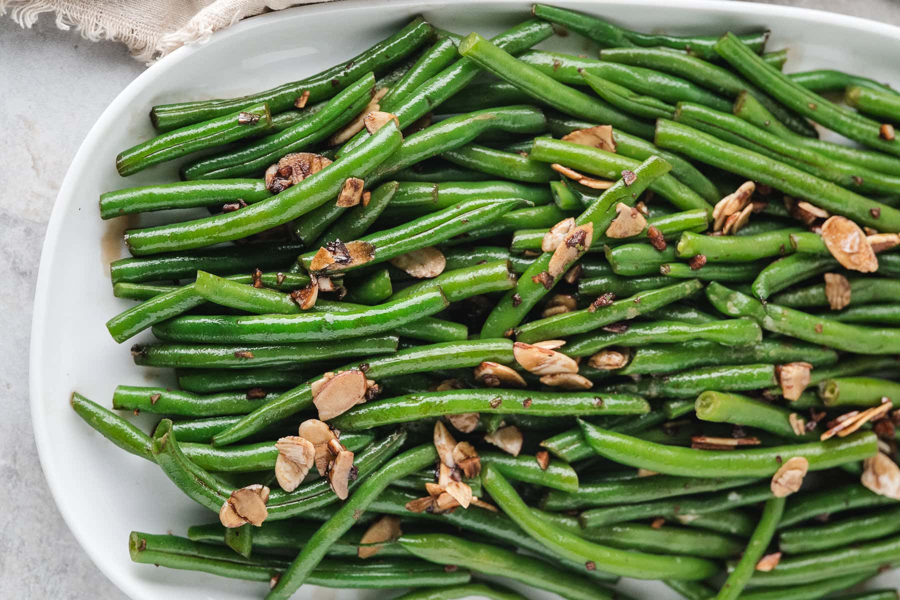 Chinese Buffet Green Beans on a white platter