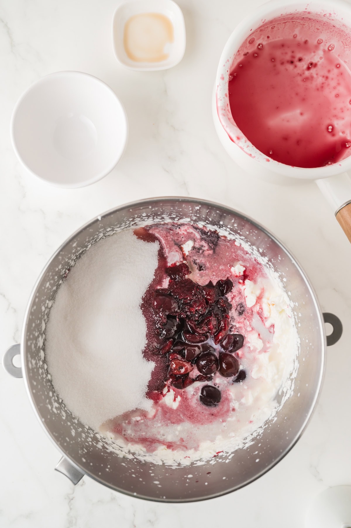 add the cherry mixture to the heavy cream