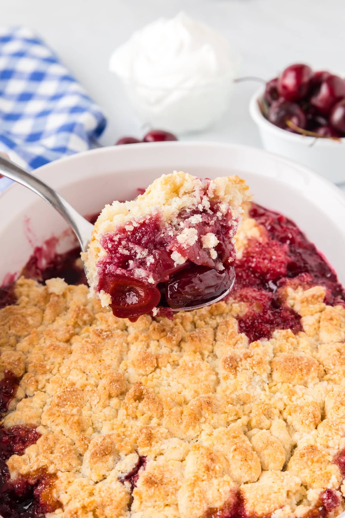 a spoonful of fresh cherry cobbler