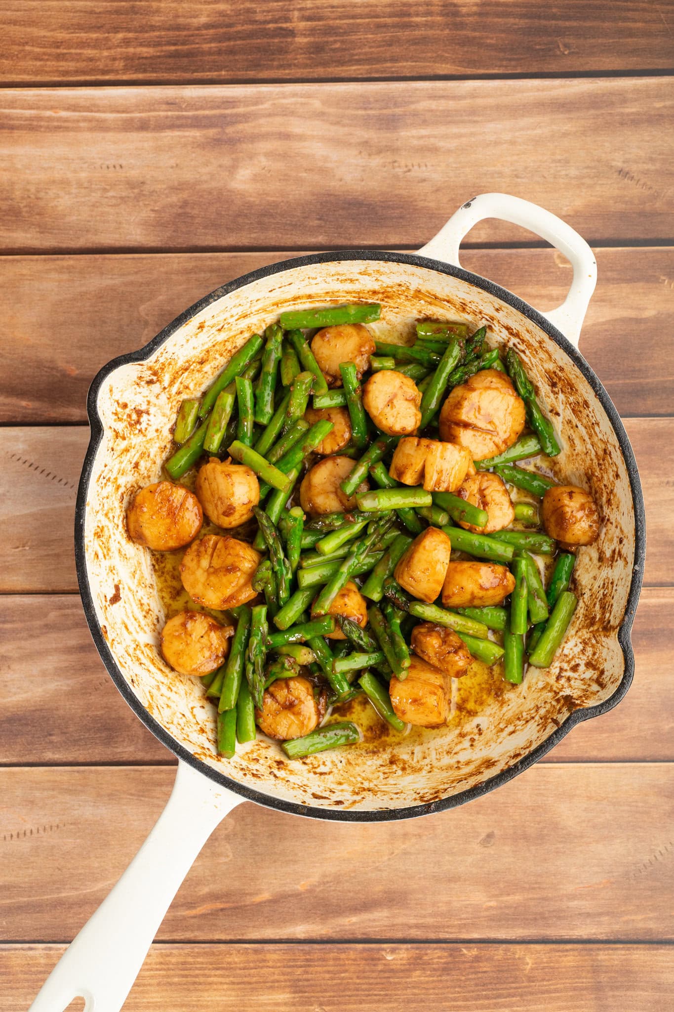 add the asparagus back into the skillet