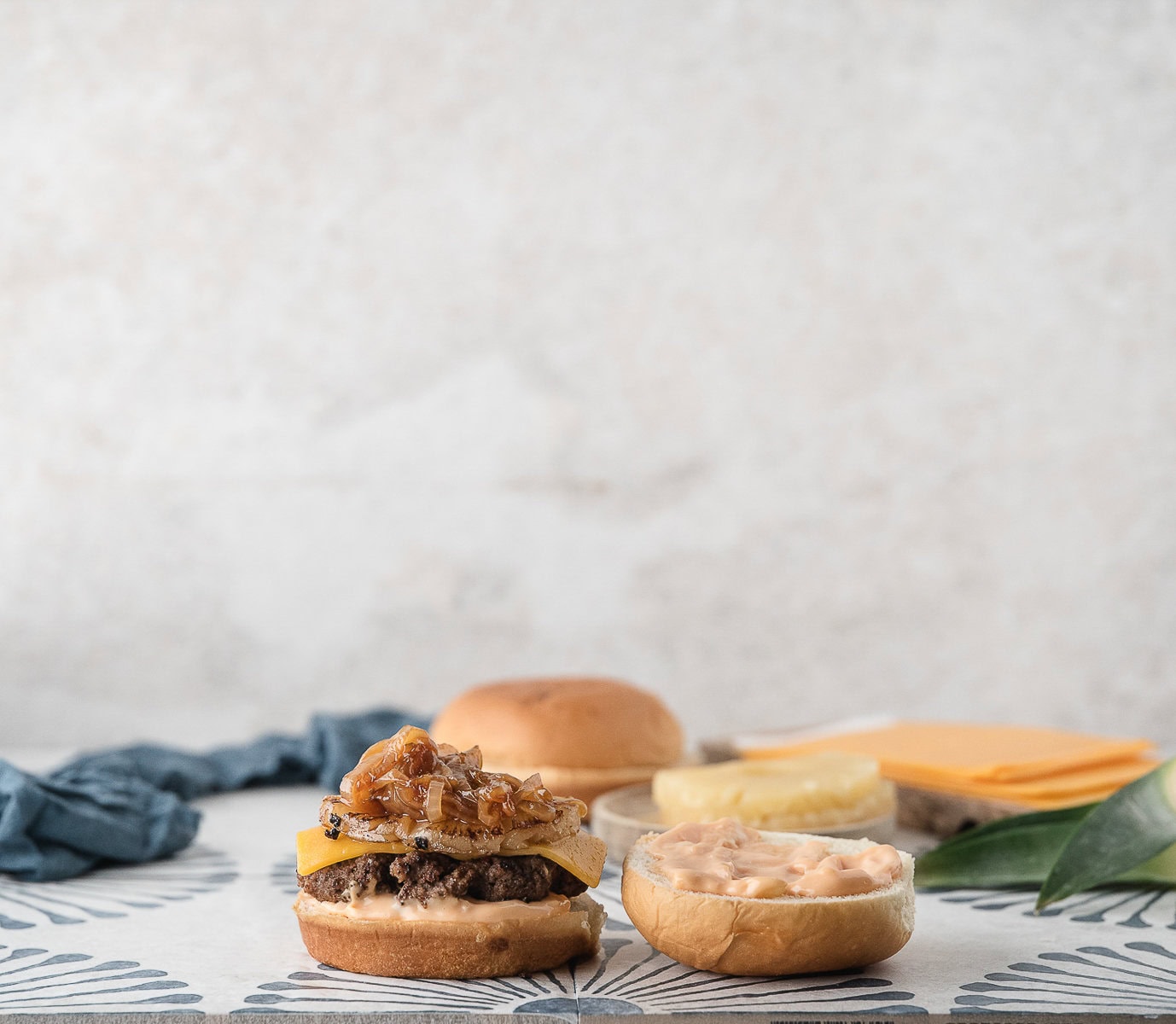 top the grilled pineapple with caramelized onions