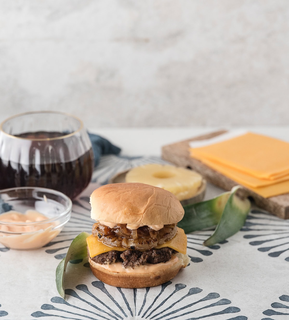 a Hawaiian burger with pineapple that was cooked on the stove