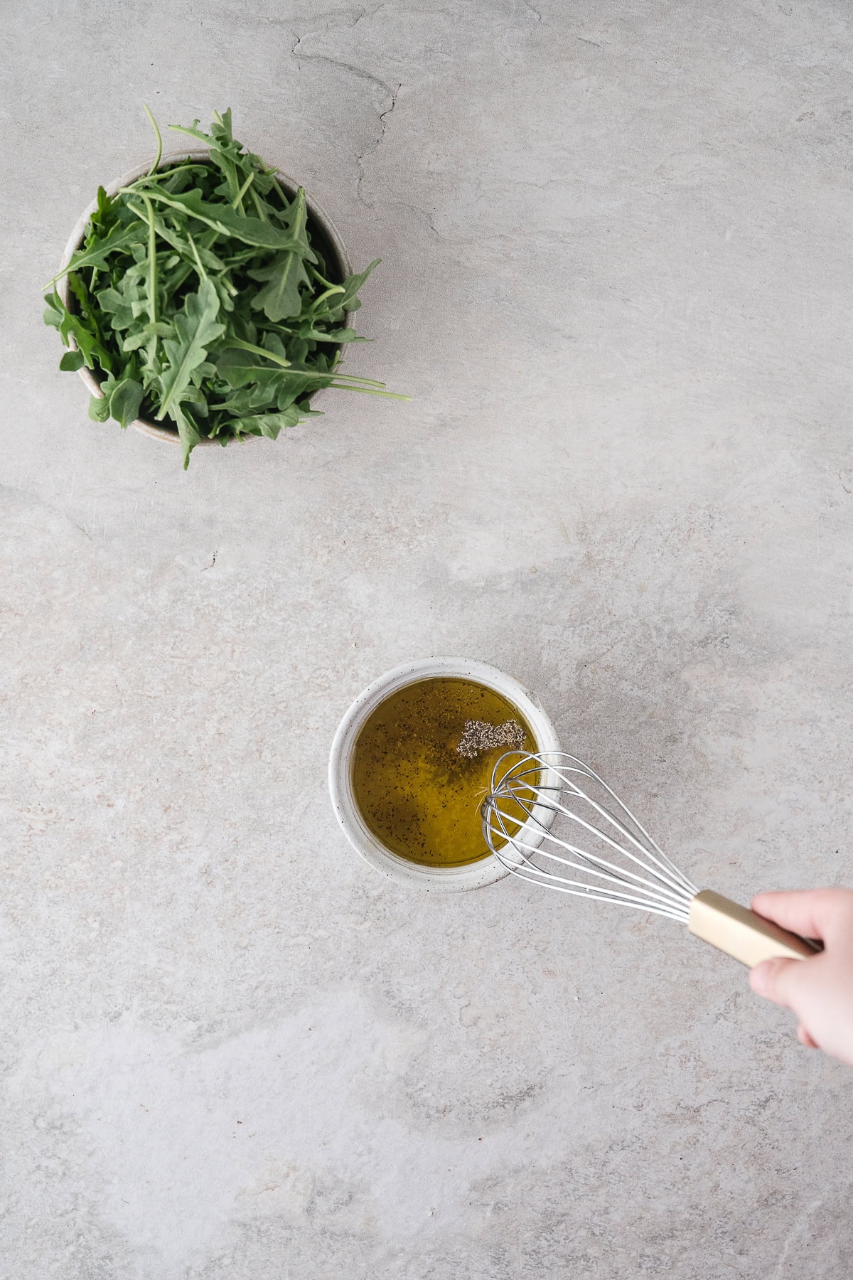 whisk the homemade salad dressing together