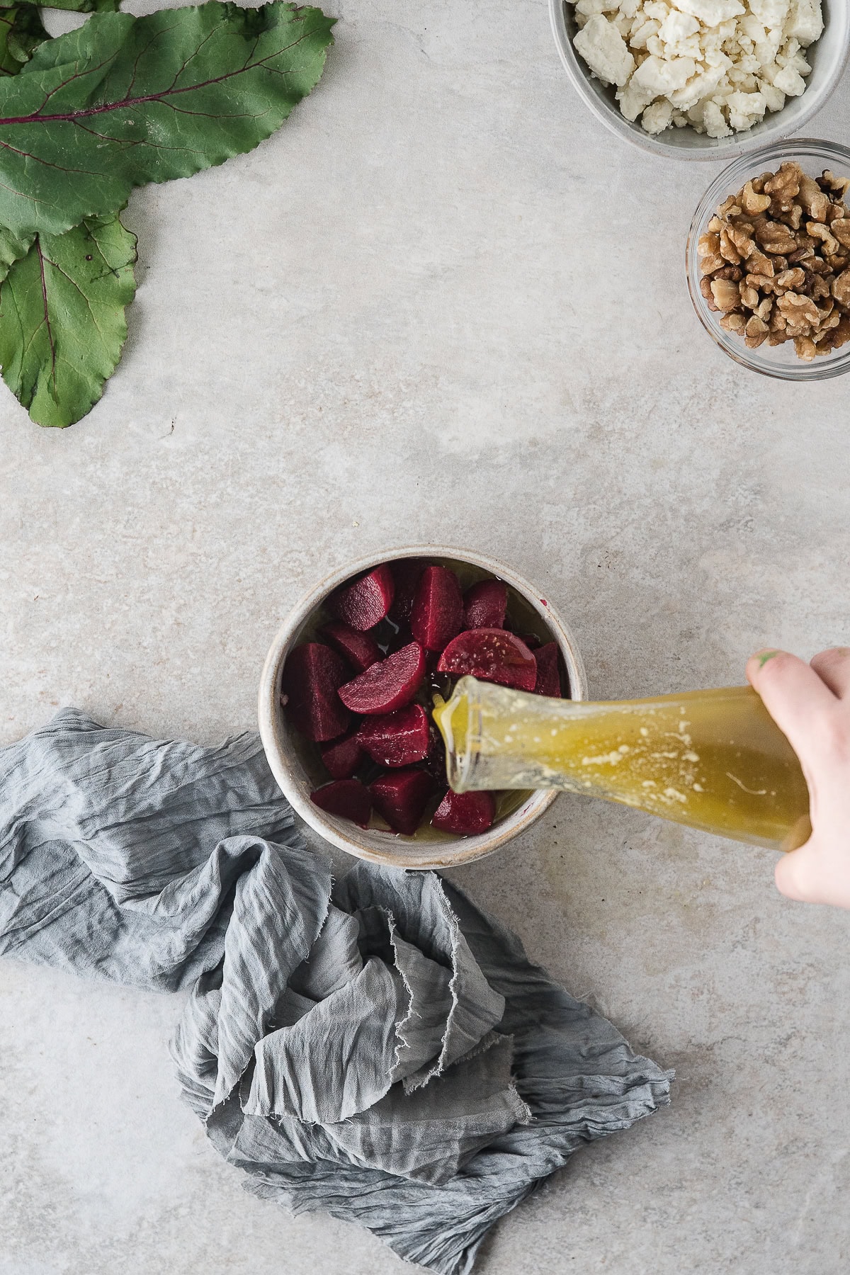 pour the homemade citrus salad dressing over the roasted beets