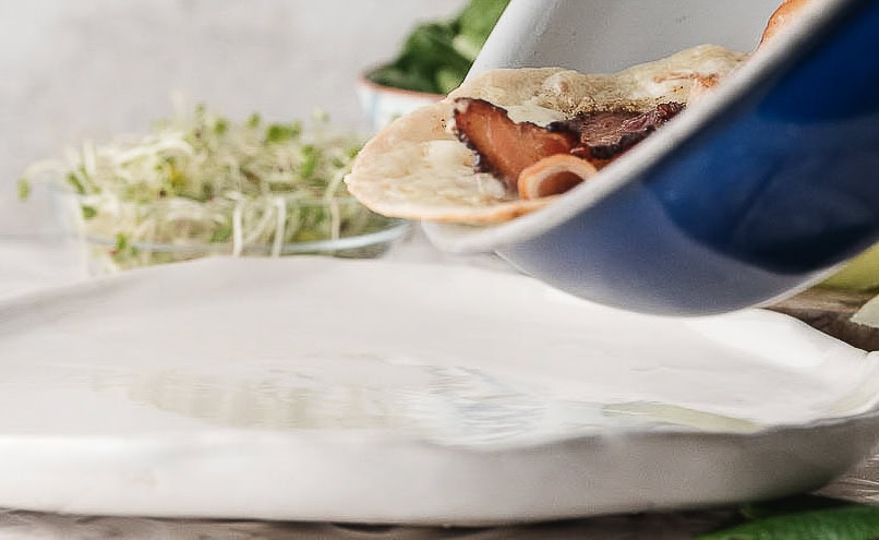 slide the warm wrap from the skillet onto a plate