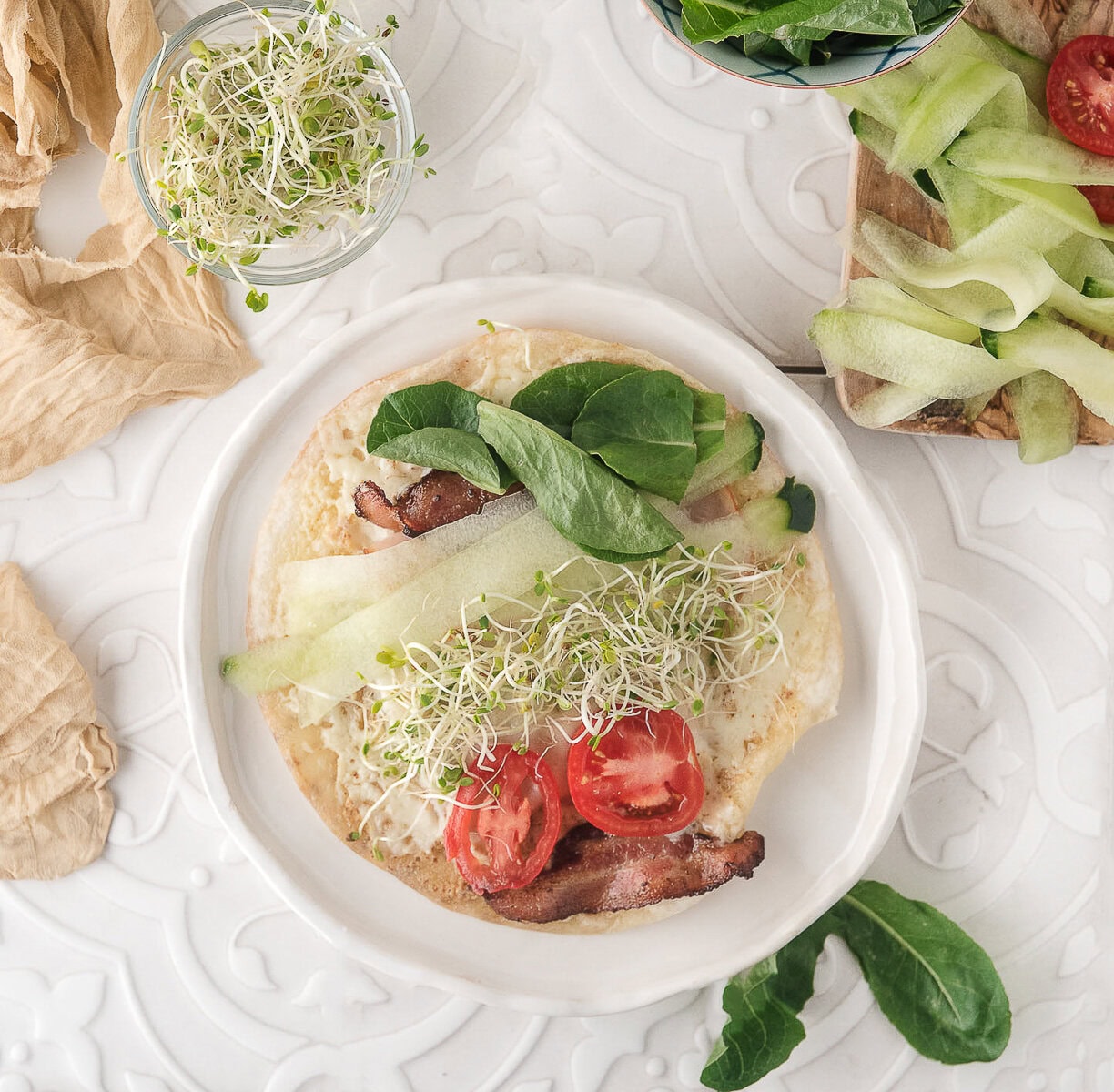 add the cucumber, spinach, tomatoes, and bean sprouts
