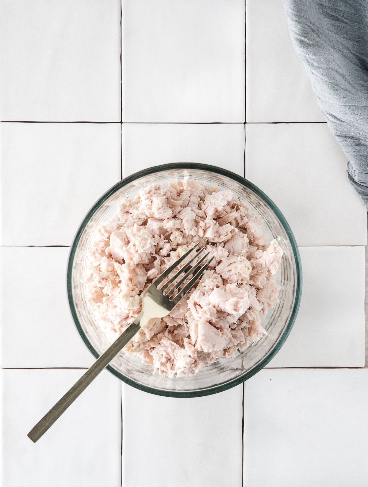 shred the canned chicken with a fork