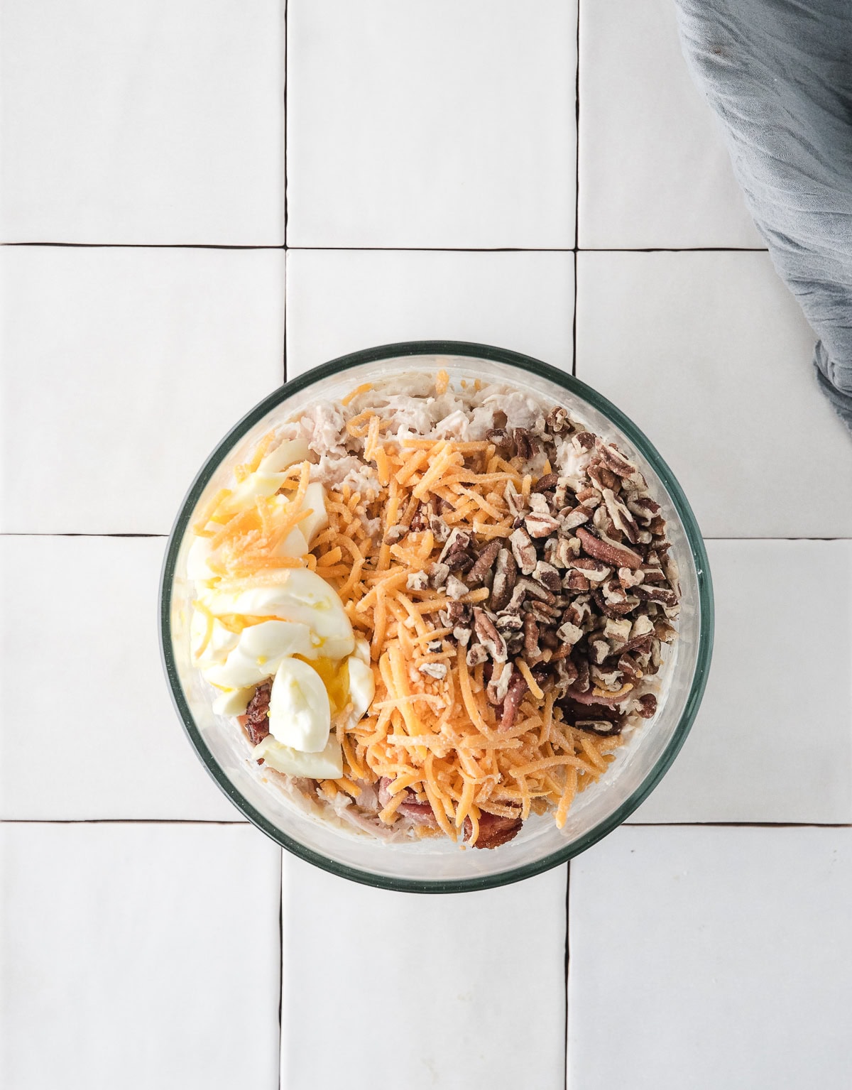 add the eggs, pecans, and cheddar cheese