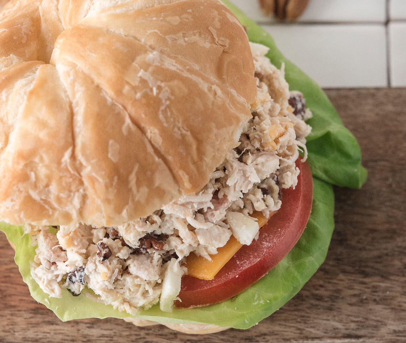 a canned chicken salad sandwich on a croissant
