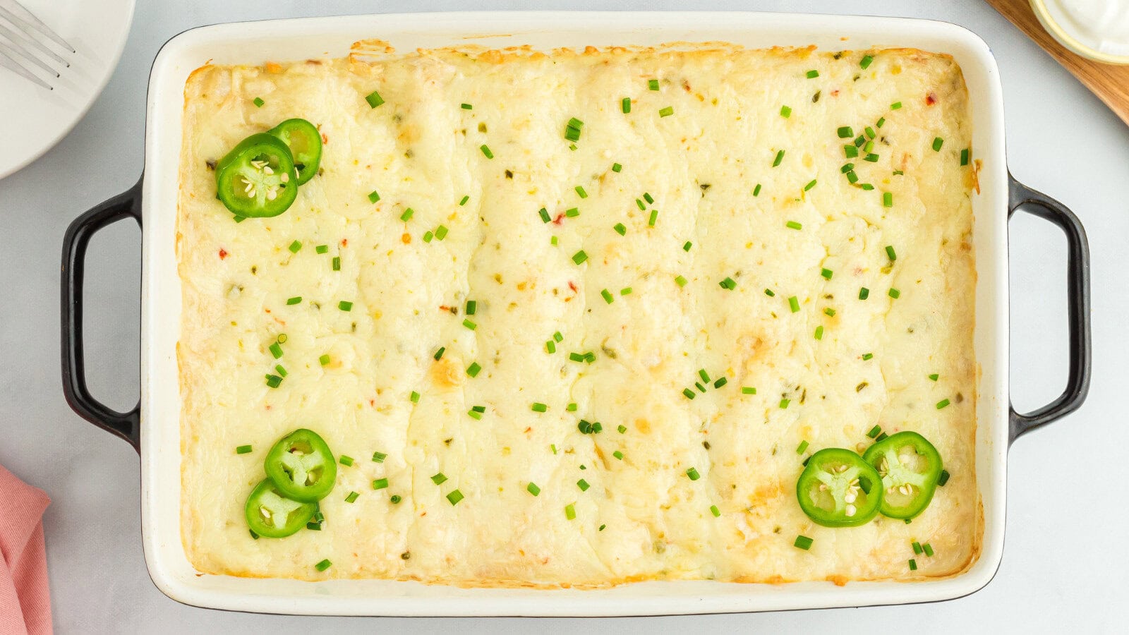a pan of Creamy White Chicken Enchiladas with Cream of Chicken