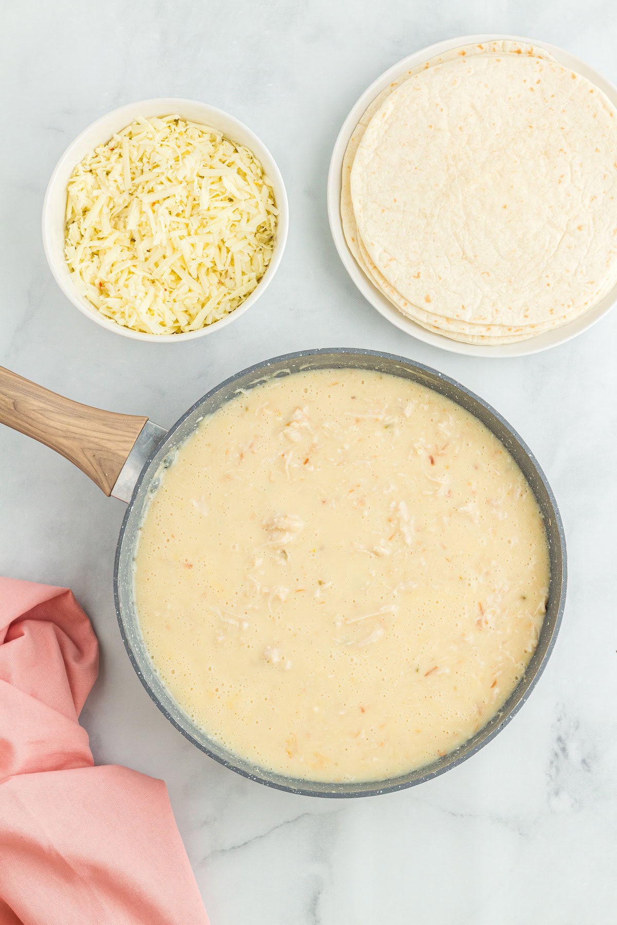 add the chicken to the soup in the skillet