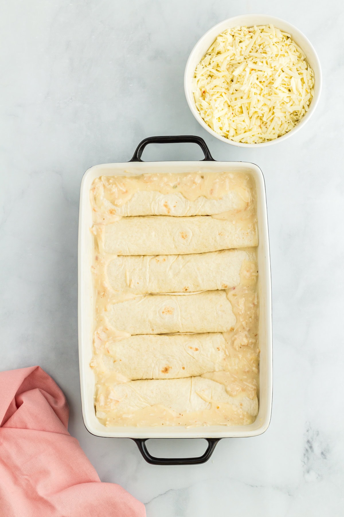 a pan of Creamy White Chicken Enchiladas with Cream of Chicken